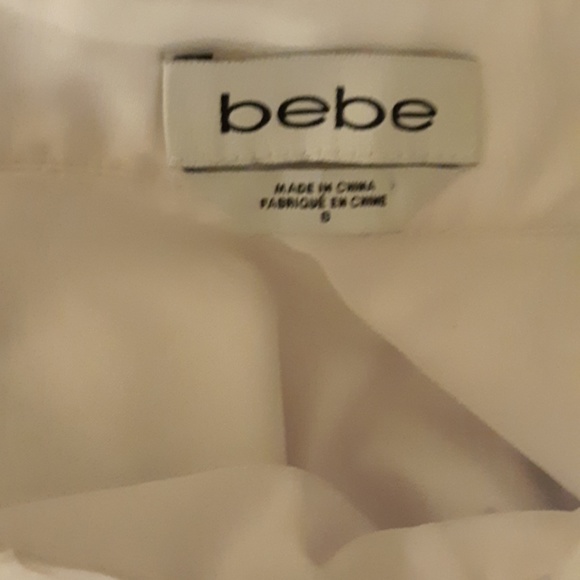 Bebe White Lace Fit & Flare Pleated Mini Skirt. - Picture 4 of 8